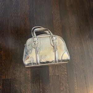 Zara mini gold purse with long shoulder strap included!